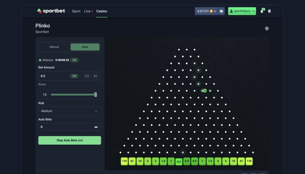 Sportbet.one Plinko board with a ball dropping through pegs into multiplier slots.